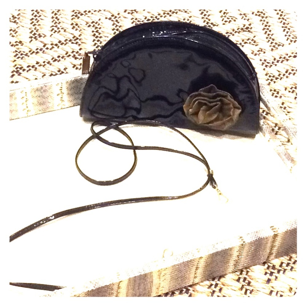 Beautiful half-moon clutch with removable strap